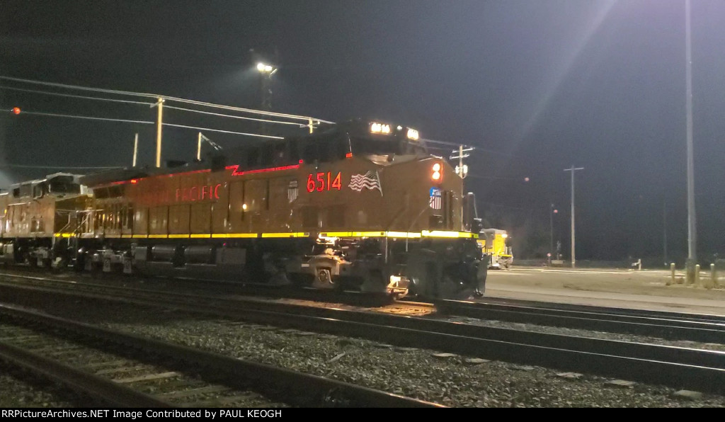 The Catch of The Night As UP 6515 Rolls Into The UP East Ogden Yard Leading The MNPRV Manifest Train. Just Delivered December 14th, 2022 at The Wabtec Fort Worth Locomotive Plant Texas.